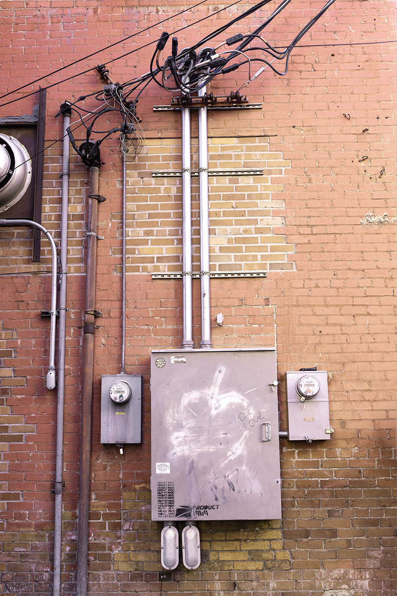 utility boxes on brick wall, Casper, Wyoming